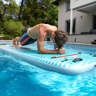 Aqua Marina 8’2” Peace 2023 Fitness Inflatable Floating Yoga Mat in action